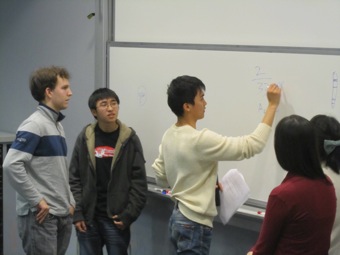 Yuan shows his calculations.
